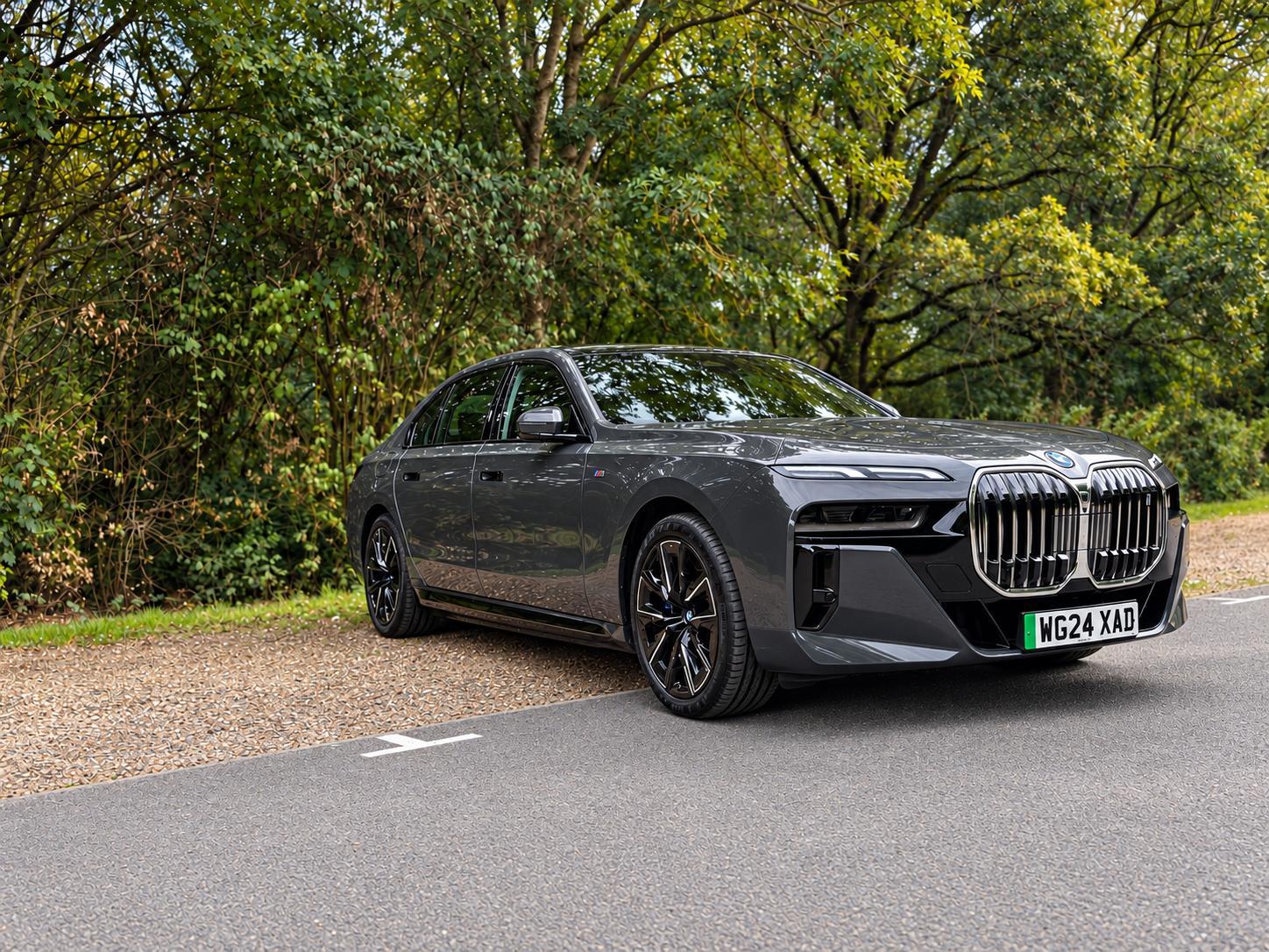 Full-length Moss Executive BMW i7 showing registration WG24 XAD